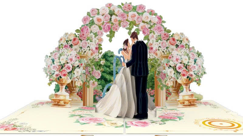 Elegant Bride & Groom Under Floral Arch
