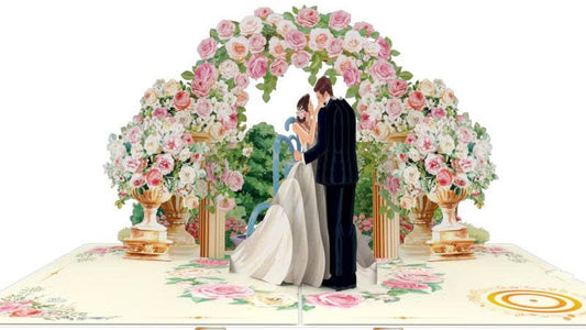 Elegant Bride & Groom Under Floral Arch